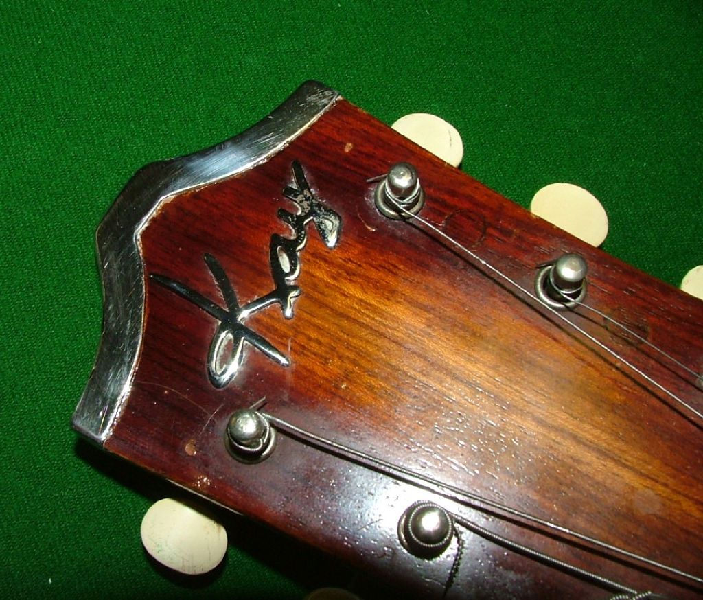 Silver metal head cap on this Kay guitar seems to be rare, I cant