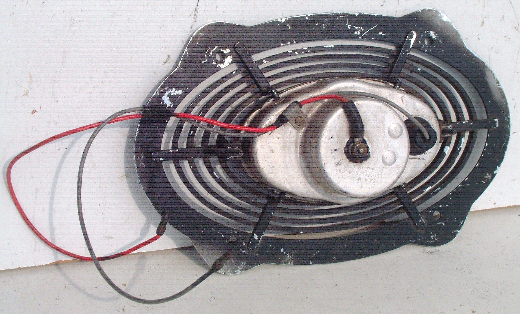 This is an original 1956 Olds clock. No cut wires.